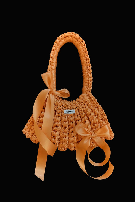 Orange satin bag